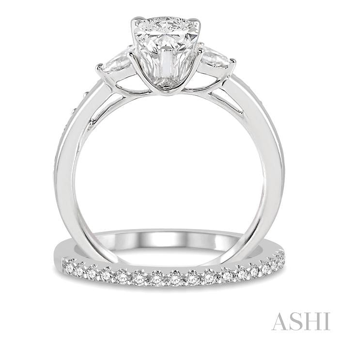 7/8 Ctw Diamond Wedding Set With 3/4 Ctw Pear Cut Engagement Ring and 1/6 Ctw Round Cut Diamond Wedding Band in 14K White Gold