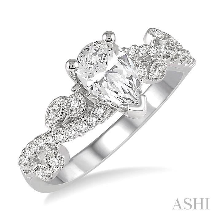 1 1/10 Ctw Diamond Engagement Ring with 3/4 Ct Pear Cut Center Diamond in 14K White Gold