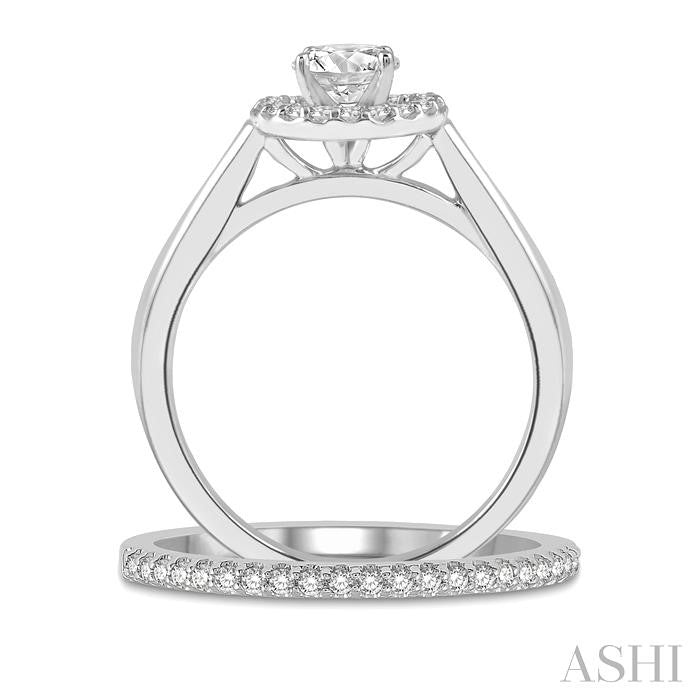 3/4 Ctw Round Cut Diamond Wedding Set With 5/8 Ct Engagement Ring and 1/6 Ct Wedding Band in 14K White Gold
