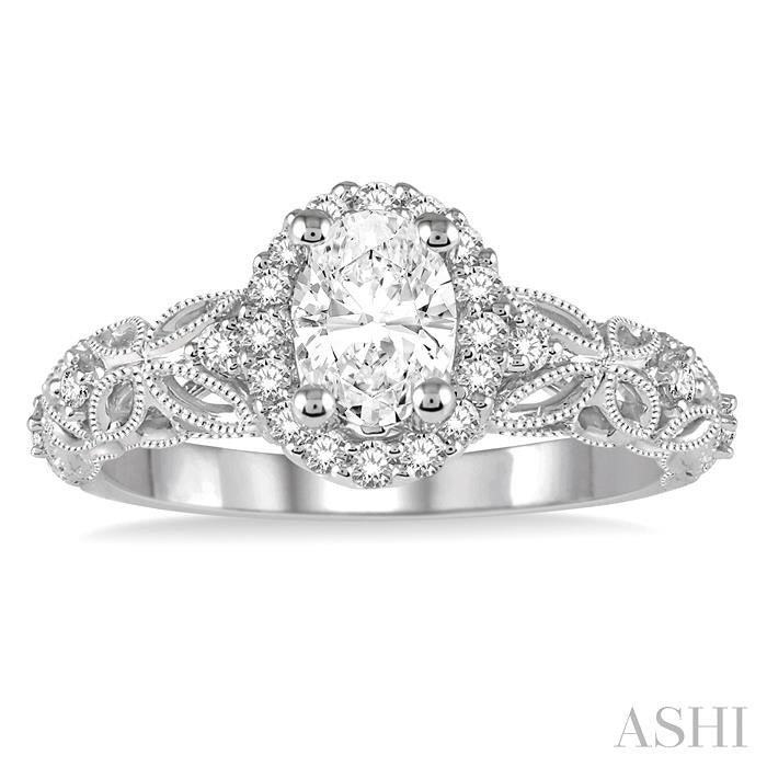 3/4 Ctw Vintage Inspired Diamond Halo Engagement Ring with 1/2 Ct Oval Cut Center Diamond in 14K White Gold