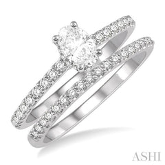 3/4 Ctw Diamond Wedding Set With 5/8 Ct Oval Shape Diamond Engagement Ring and 1/6 Ct Wedding Band in 14K White Gold