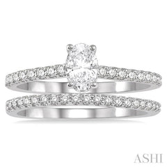 3/4 Ctw Diamond Wedding Set With 5/8 Ct Oval Shape Diamond Engagement Ring and 1/6 Ct Wedding Band in 14K White Gold