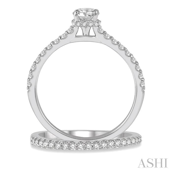 3/4 Ctw Diamond Wedding Set With 5/8 Ct Round Cut Diamond Engagement Ring and 1/6 Ct Wedding Band in 14K White Gold