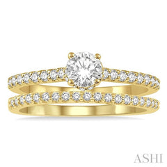 3/4 Ctw Diamond Wedding Set With 5/8 Ct Round Cut Diamond Engagement Ring and 1/6 Ct Wedding Band in 14K Yellow Gold