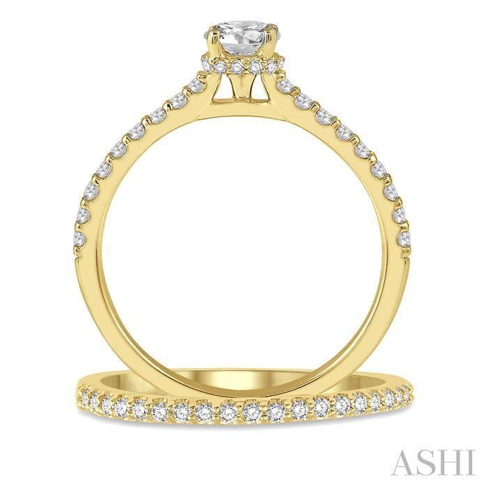 3/4 Ctw Diamond Wedding Set With 5/8 Ct Round Cut Diamond Engagement Ring and 1/6 Ct Wedding Band in 14K Yellow Gold