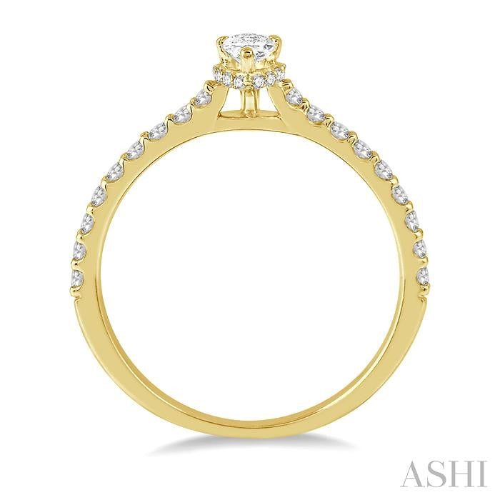1/2 Ctw Round Cut Diamond Engagement Ring With 1/4 Ct Pear Cut Center Stone in 14K Yellow Gold
