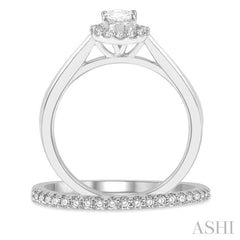 3/4 Ctw Round Cut Diamond Wedding Set With 5/8 Ct Oval Cut Engagement Ring and 1/6 Ct Round Cut Diamond Wedding Band in 14K White Gold