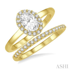 3/4 Ctw Round Cut Diamond Wedding Set With 5/8 Ct Oval Cut Engagement Ring and 1/6 Ct Round Cut Diamond Wedding Band in 14K Yellow and White Gold