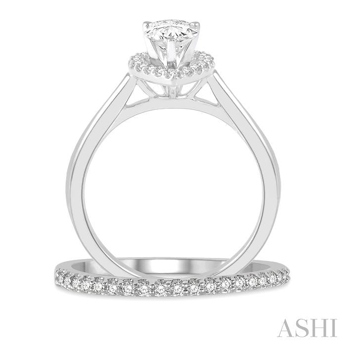 3/4 Ctw Round Cut Diamond Wedding Set With 5/8 Ct Pear Cut Engagement Ring and 1/6 Ct Wedding Band in 14K White Gold