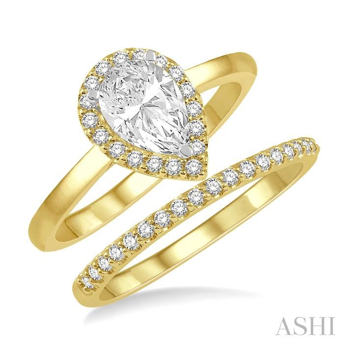 3/4 Ctw Round Cut Diamond Wedding Set With 5/8 Ct Pear Cut Engagement Ring and 1/6 Ct Wedding Band in 14K Yellow and White Gold