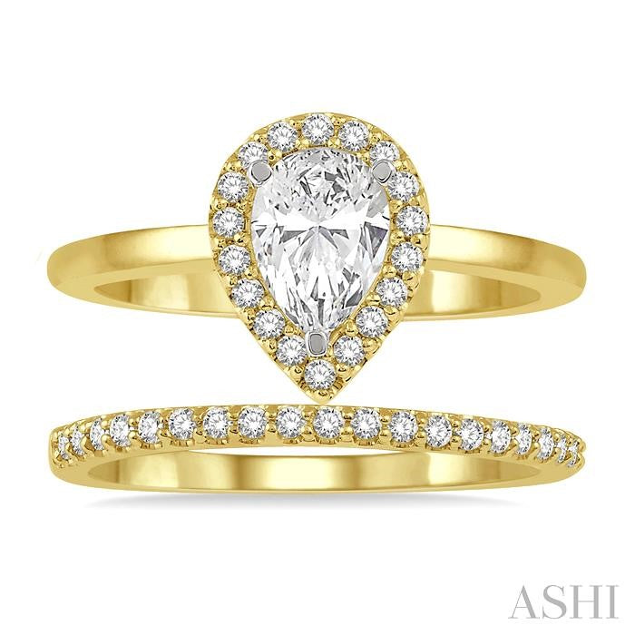 3/4 Ctw Round Cut Diamond Wedding Set With 5/8 Ct Pear Cut Engagement Ring and 1/6 Ct Wedding Band in 14K Yellow and White Gold