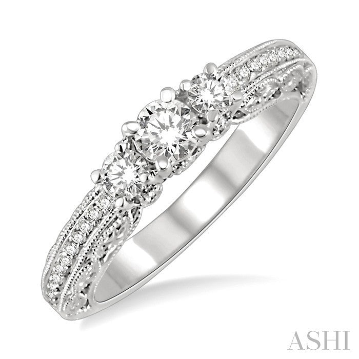 1/2 Ctw Diamond Engagement Ring with 1/5 Ct Round Cut Center Stone in 14K White Gold