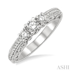 1/2 Ctw Diamond Engagement Ring with 1/5 Ct Round Cut Center Stone in 14K White Gold