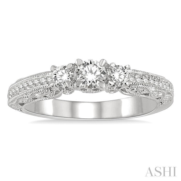 1/2 Ctw Diamond Engagement Ring with 1/5 Ct Round Cut Center Stone in 14K White Gold