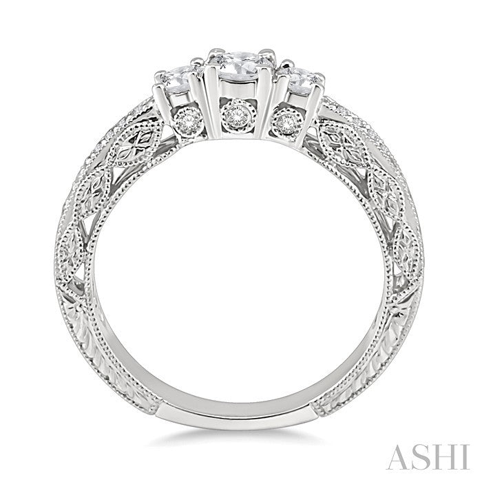 1/2 Ctw Diamond Engagement Ring with 1/5 Ct Round Cut Center Stone in 14K White Gold
