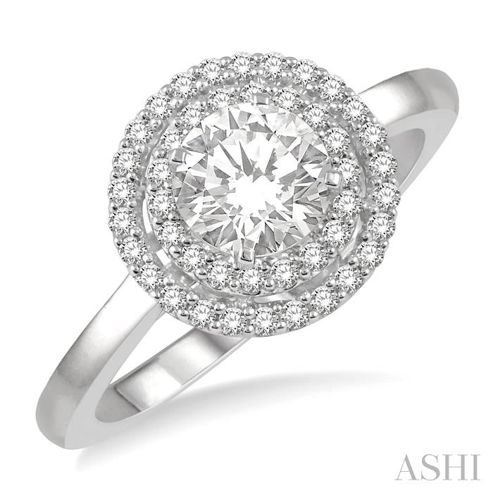 3/4 Ctw Round Cut Diamond Ladies Engagement Ring with 1/2 Ctw Round Cut Center Stone in 14K White Gold