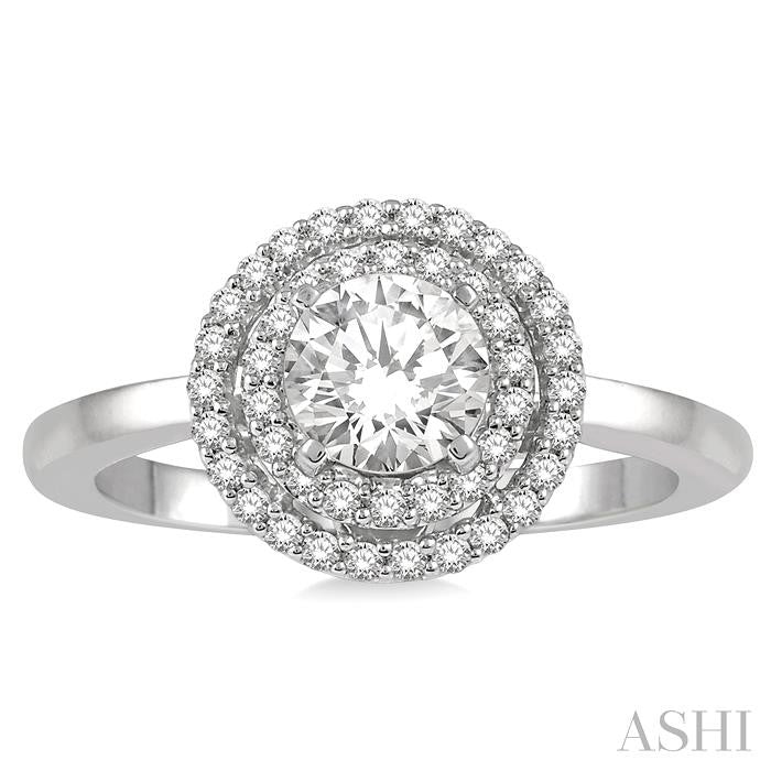 3/4 Ctw Round Cut Diamond Ladies Engagement Ring with 1/2 Ctw Round Cut Center Stone in 14K White Gold