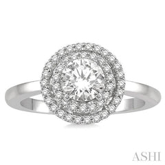 3/4 Ctw Round Cut Diamond Ladies Engagement Ring with 1/2 Ctw Round Cut Center Stone in 14K White Gold
