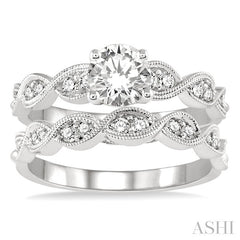 7/8 Ctw Diamond Wedding Set with 3/4 Ctw Round Cut Engagement Ring and 1/5 Ctw Wedding Band in 14K White Gold