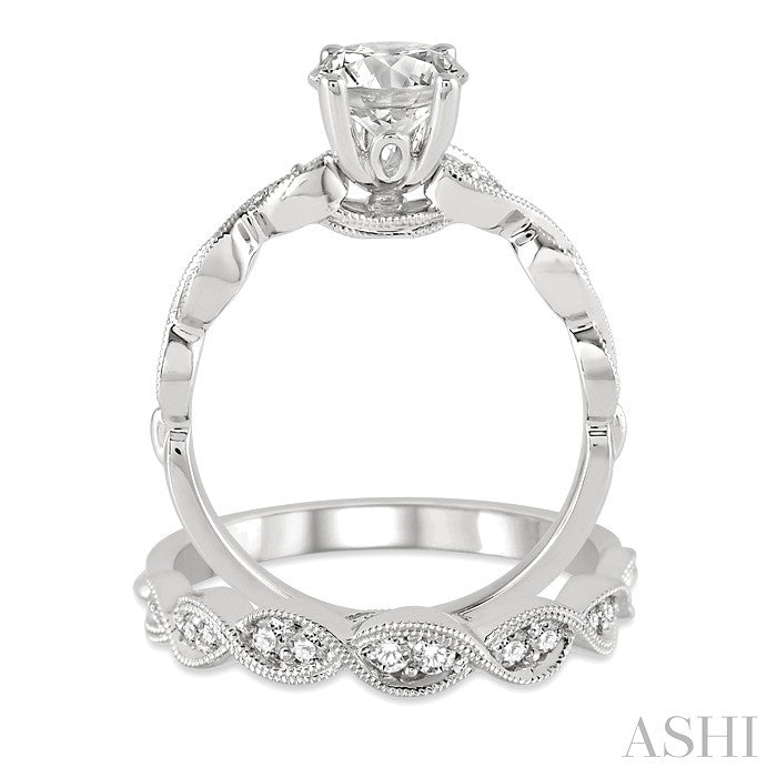 7/8 Ctw Diamond Wedding Set with 3/4 Ctw Round Cut Engagement Ring and 1/5 Ctw Wedding Band in 14K White Gold