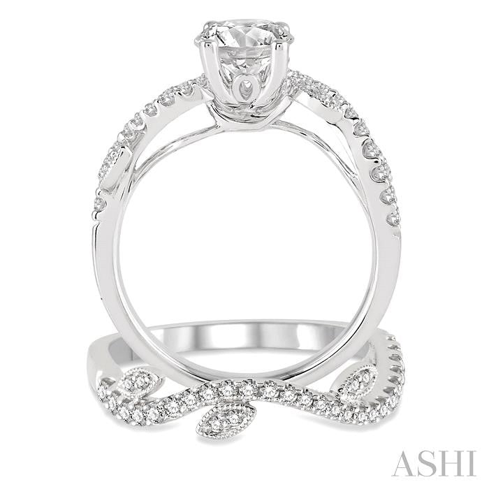 1 1/10 Ctw Diamond Wedding Set with 7/8 Ctw Round Cut Engagement Ring and 1/4 Ctw Wedding Band in 14K White Gold