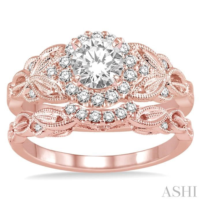 3/4 Ctw Diamond Wedding Set with 5/8 Ctw Round Cut Engagement Ring and 1/10 Ctw Wedding Band in 14K Rose Gold