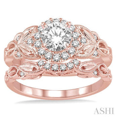 3/4 Ctw Diamond Wedding Set with 5/8 Ctw Round Cut Engagement Ring and 1/10 Ctw Wedding Band in 14K Rose Gold