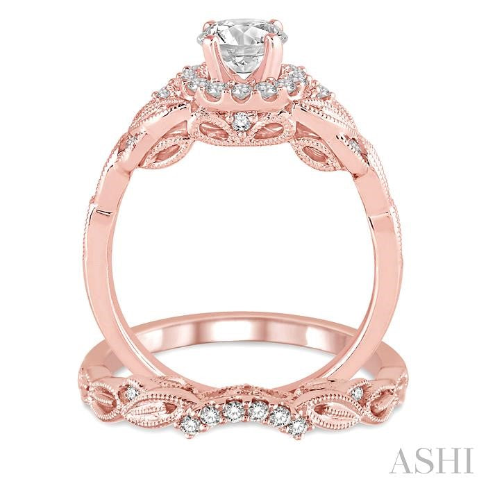 3/4 Ctw Diamond Wedding Set with 5/8 Ctw Round Cut Engagement Ring and 1/10 Ctw Wedding Band in 14K Rose Gold