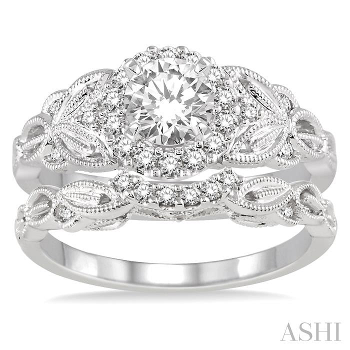 3/4 Ctw Diamond Wedding Set with 5/8 Ctw Round Cut Engagement Ring and 1/10 Ctw Wedding Band in 14K White Gold
