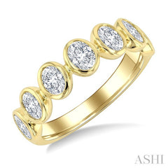 1 1/4 Ctw 7 Stone Bezel Set Oval Cut Diamond Fashion Band in 14K Yellow Gold