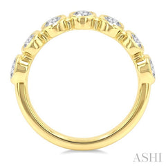 1 1/4 Ctw 7 Stone Bezel Set Oval Cut Diamond Fashion Band in 14K Yellow Gold