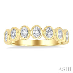 1 Ctw 7 Stone Bezel Set Oval Cut Diamond Fashion Band in 14K Yellow Gold