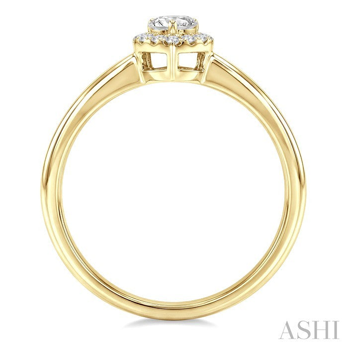 1/4 Ctw Heart and Round Cut Diamond Fashion Halo Ring in 14K Yellow Gold
