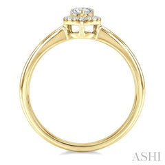 1/4 Ctw Heart and Round Cut Diamond Fashion Halo Ring in 14K Yellow Gold