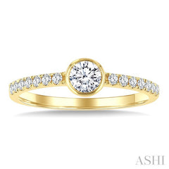 1/2 Ctw Bezel Set Round Cut Diamond Ring in 14K Yellow Gold