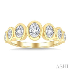 1 Ctw 7 Stone Bezel Set Oval Cut Diamond Fashion Band in 14K Yellow Gold