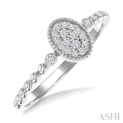 1/8 Ctw Petite Bead Shank Oval Center Round Cut Diamond Fashion Ring in 10K White Gold