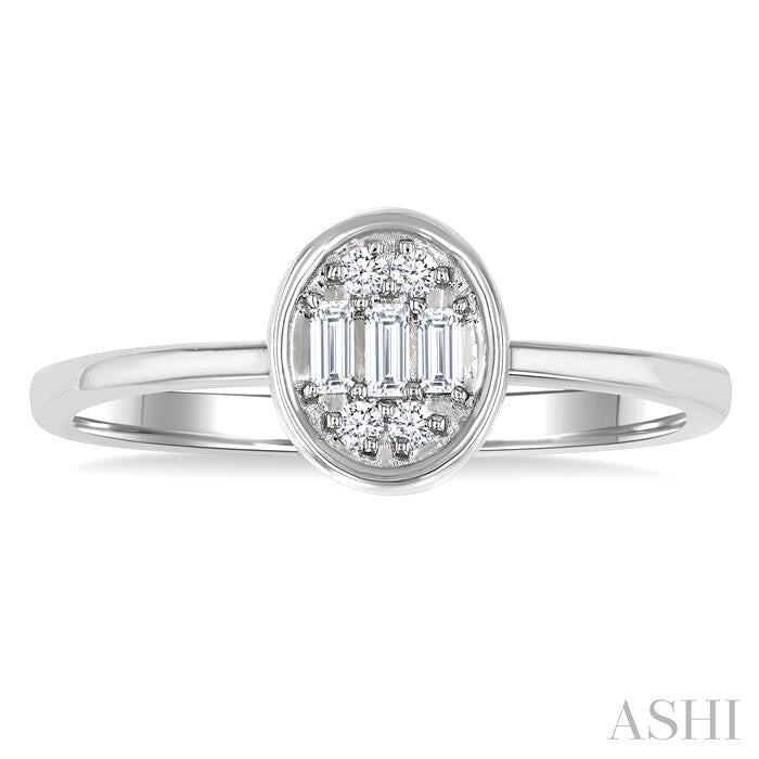 1/6 Ctw Petite Bezel Set Oval Shape Fusion Baguette and Round Cut Diamond Fashion Ring in 10K White Gold