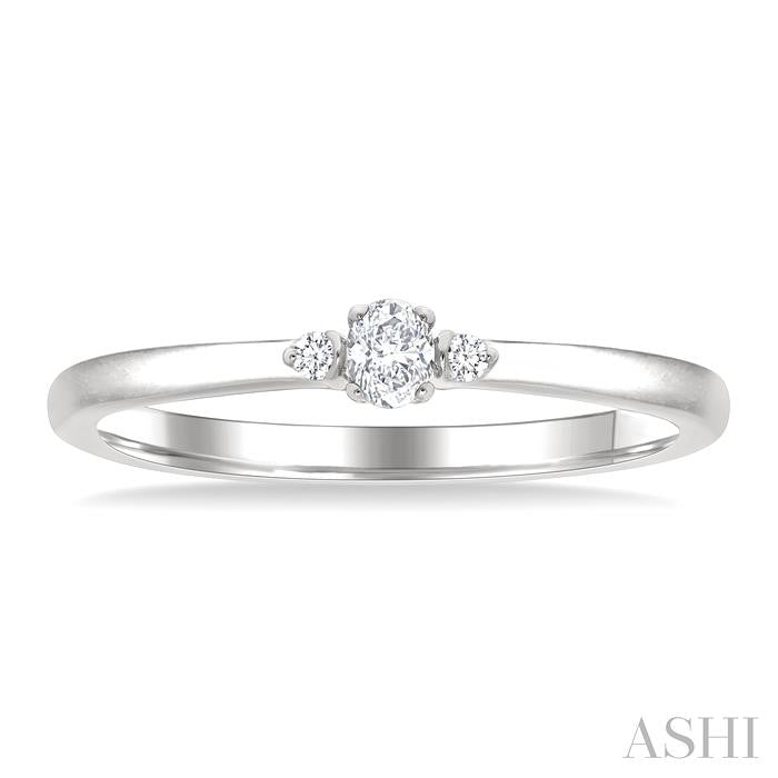 1/10 Ctw Three Stone Oval and Round Cut Diamond Petite Fashion Ring in 10K White Gold