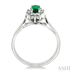5x3mm Oval Cut Emerald and 1/10 Ctw Round Cut Diamond Ring in 14K White Gold