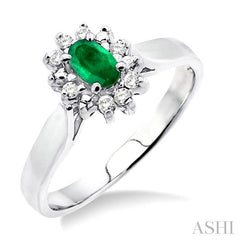 5x3mm Oval Cut Emerald and 1/10 Ctw Round Cut Diamond Ring in 10K White Gold