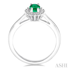 6X4 MM Oval Cut Emerald Center and 1/8 Ctw Round Cut Diamond Halo Precious Stone Ring in 10K White Gold
