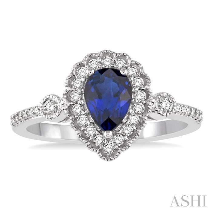 7X5 MM Pear Shape Sapphire Center and 1/4 Ctw Round Cut Diamond Precious Stone Ring in 14K White Gold