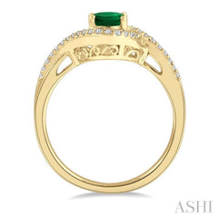 7X5 MM Oval Cut Emerald and 1/5 Ctw Bypass Split Shank Round Cut Diamond Precious Ring in 14K Yellow Gold