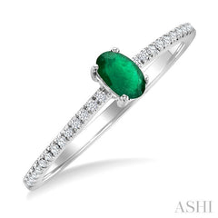 5x3 MM Oval Cut Emerald and 1/10 Ctw Petite Round Cut Diamond Precious Fashion Ring in 10K White Gold