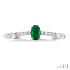 5x3 MM Oval Cut Emerald and 1/10 Ctw Petite Round Cut Diamond Precious Fashion Ring in 10K White Gold