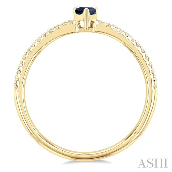 5x3 MM Pear Cut Sapphire and 1/10 Ctw Petite Round Cut Diamond Precious Fashion Ring in 10K Yellow Gold