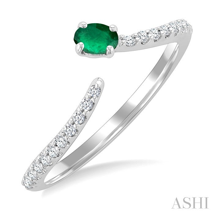 4X3 MM Oval Cut Emerald and 1/10 Ctw Petite Round Cut Diamond Precious Fashion Ring in 10K White Gold