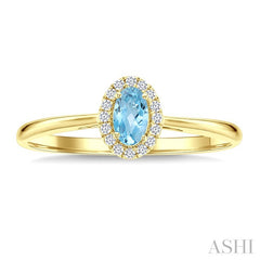 5x3 MM Oval Shape Aquamarine and 1/20 Ctw Round Cut Diamond Halo Semi-Precious Ring in 14K Yellow Gold