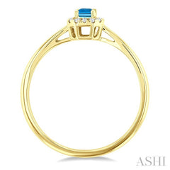 5x3 MM Octagonal Shape Blue Topaz and 1/20 Ctw Round Cut Diamond Halo Semi-Precious Ring in 14K Yellow Gold